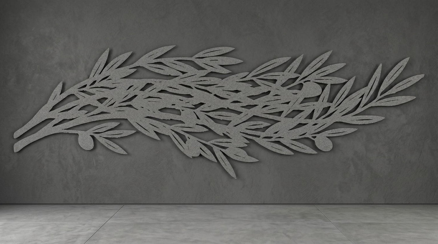 a large, abstract leaf-like design on a grey wall.