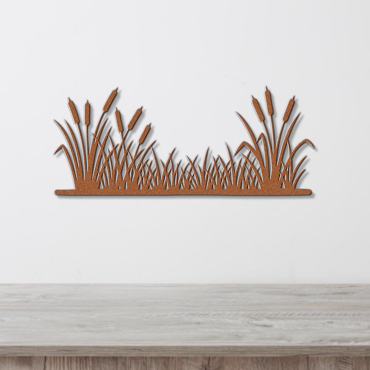 A wall-mounted wooden shelf with a decorative design of reeds or grasses on it.