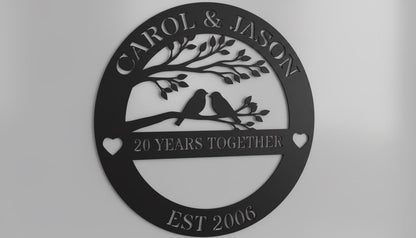 A black and white image of a decorative metal plaque with the text "CAROL & JASON" and "20 YEARS TOGETHER" along with the year "EST 2006" below it.