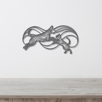 A decorative metal wall art piece depicting two stylized dogs in mid-leap, with flowing lines and curves creating a dynamic and abstract design.