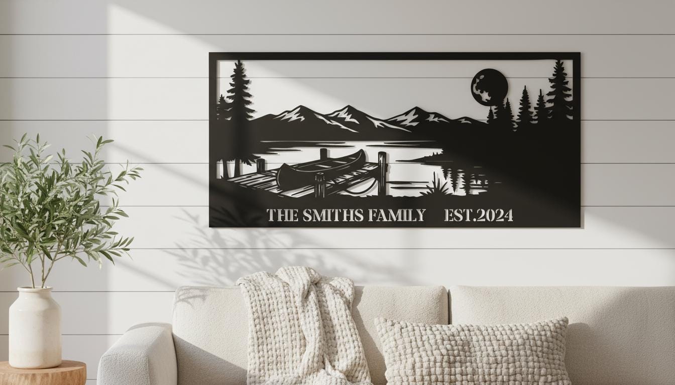 a black and white silhouette of a lake with a dock, mountains in the background, and a full moon. The text "THE SMITH FAMILY EST. 2024" is displayed below the silhouette.