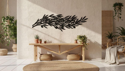a modern and minimalist interior design with a large black leaf-shaped wall art piece, a wooden table with potted plants, and a woven chair.