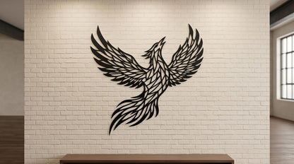 A black and white image of a stylized phoenix, a mythical bird, is mounted on a white brick wall.