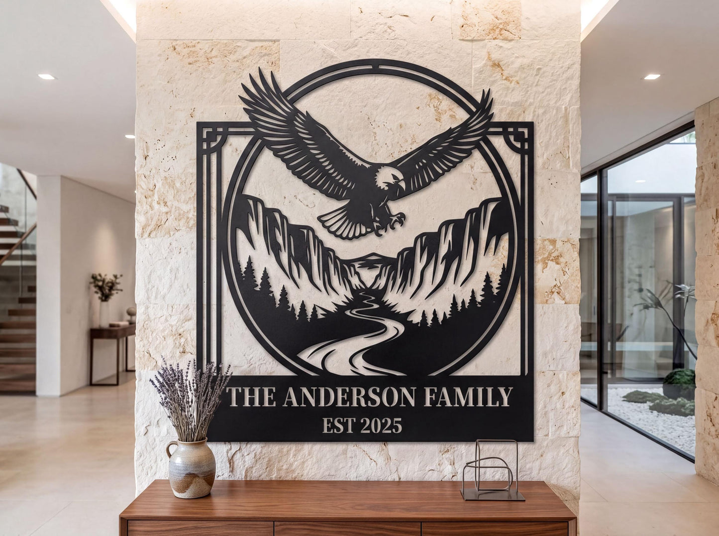 a wall art piece depicting an eagle soaring over a mountainous landscape, with the text "THE ANDERSON FAMILY EST 2025" below it.