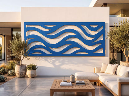 a modern outdoor living space with a large blue wave-shaped wall art piece, a wooden coffee table, and a comfortable couch.
