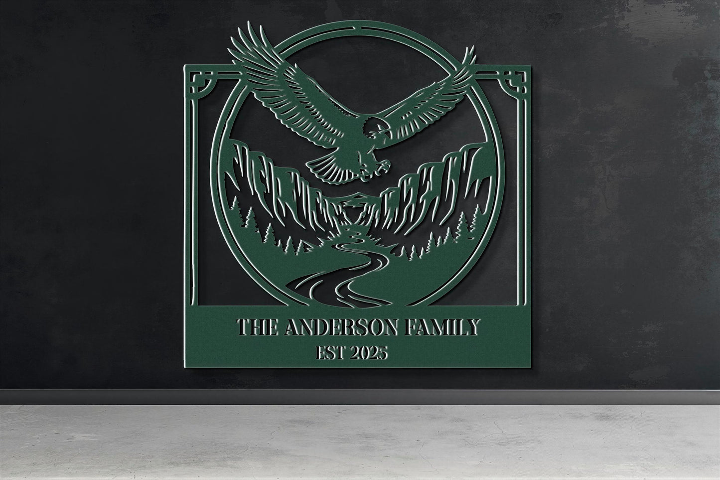 a green metal sign with an eagle and mountains in the background, mounted on a wall.