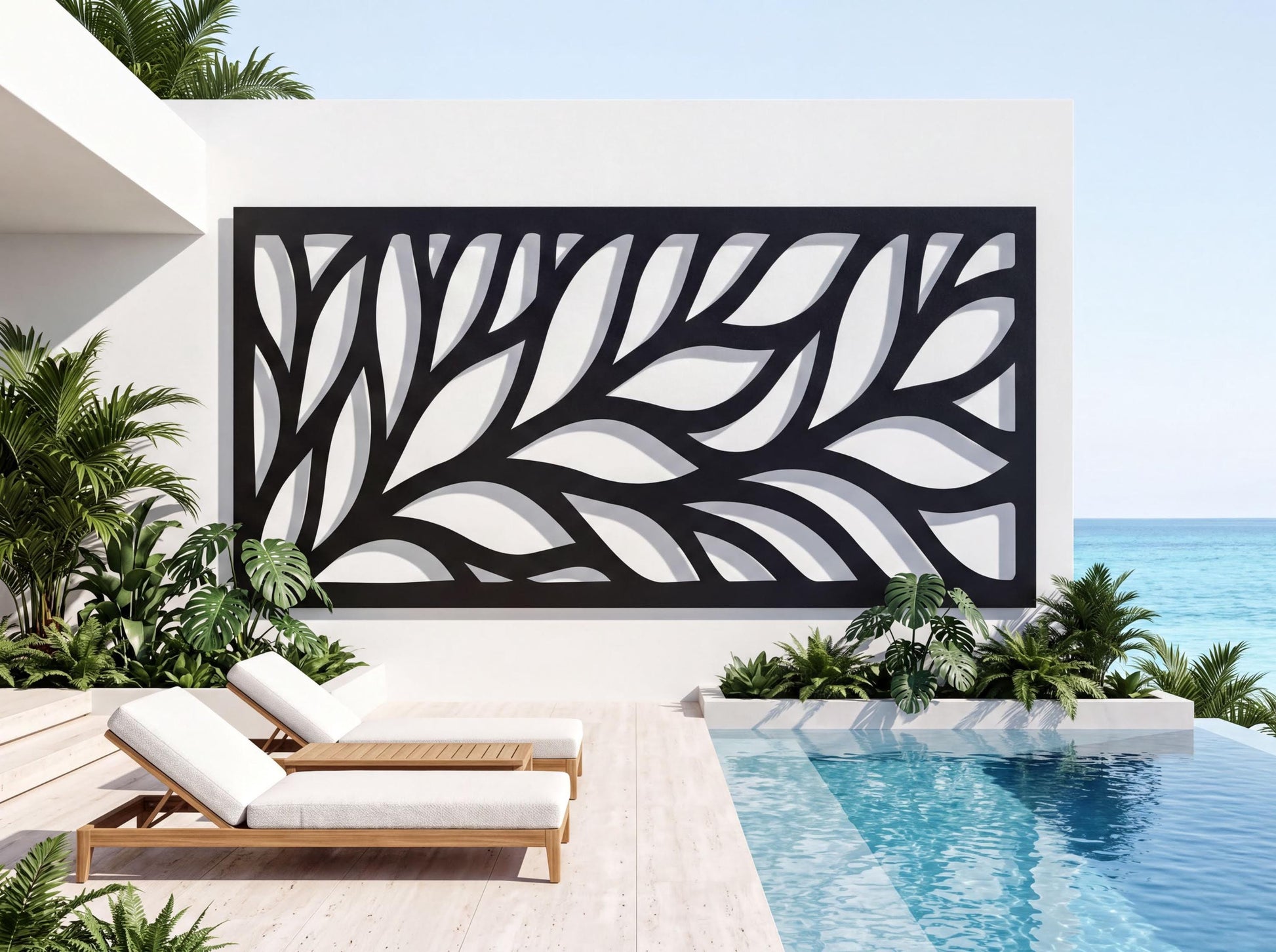 a modern outdoor pool area with a large black and white leaf-like design on the wall behind it, creating a striking visual contrast. The pool area is furnished with two white lounge chairs, and the scene is surrounded by lush tropical plants, including palm trees, which add to the serene and relaxing atmosphere.