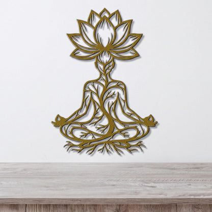 A wall art piece depicting a stylized figure in a meditative pose, with intricate tree-like patterns surrounding it.